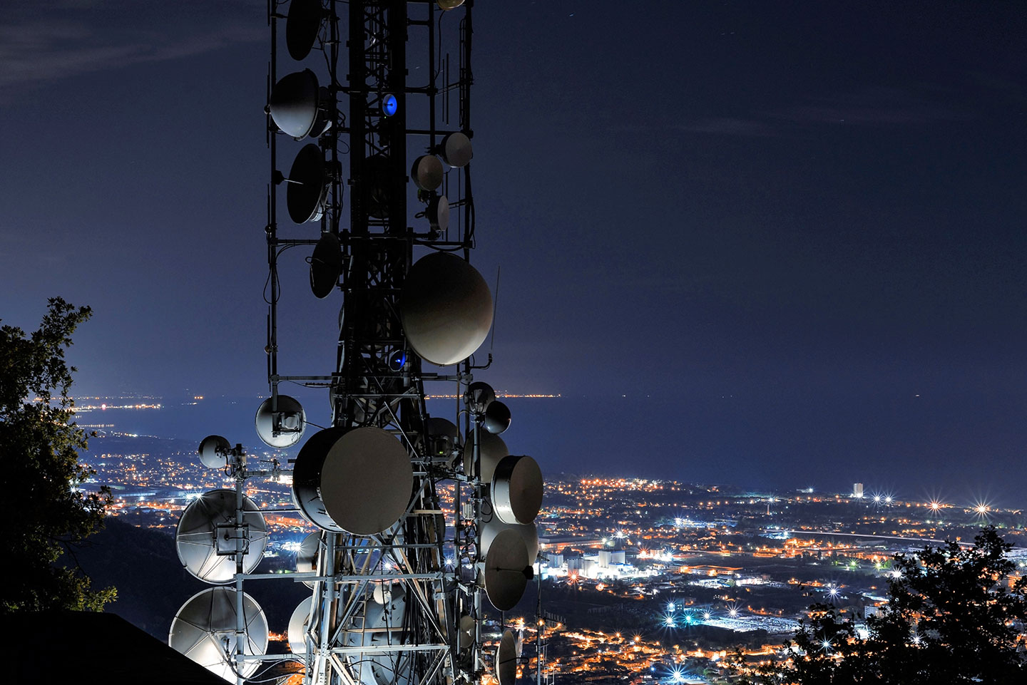 satellite dish tower overlooking city